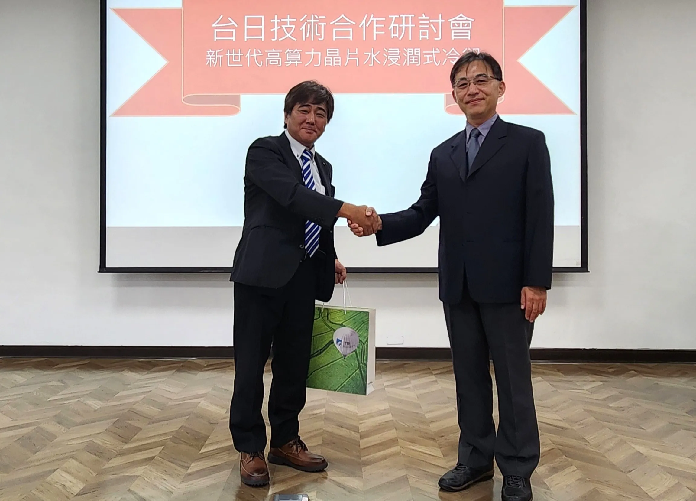 工研院攜手日本新創ZYRQ 開發全球首創水浸潤式冷卻技術 臺日合作引領AI時代永續高效運算新典範